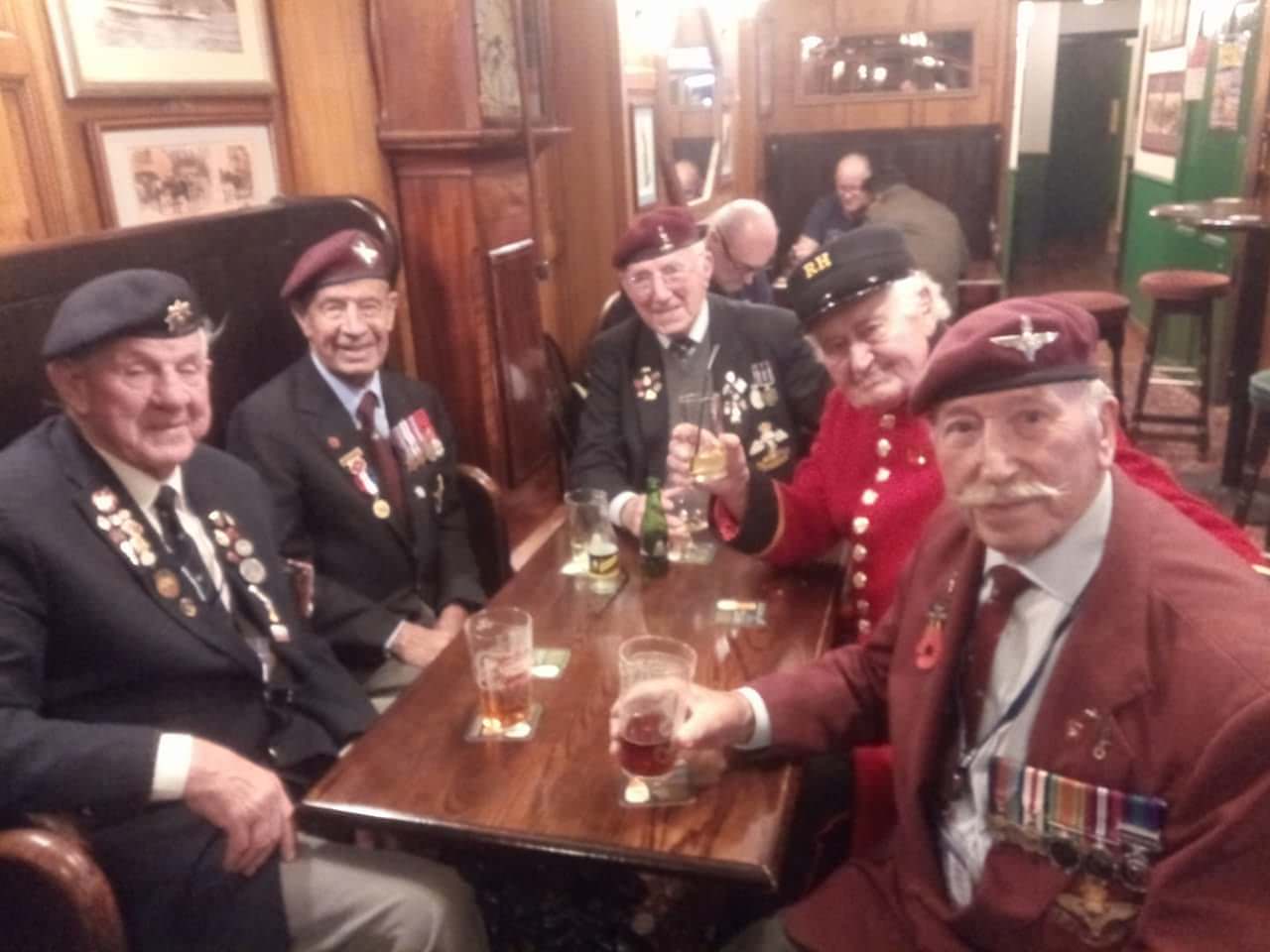 Legends of the past raising a glass.